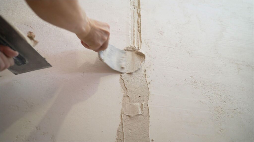 Putty is effective in mending small cracks in walls